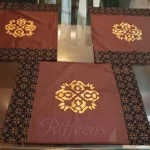 brown with golden/black screen printed patchwork mat